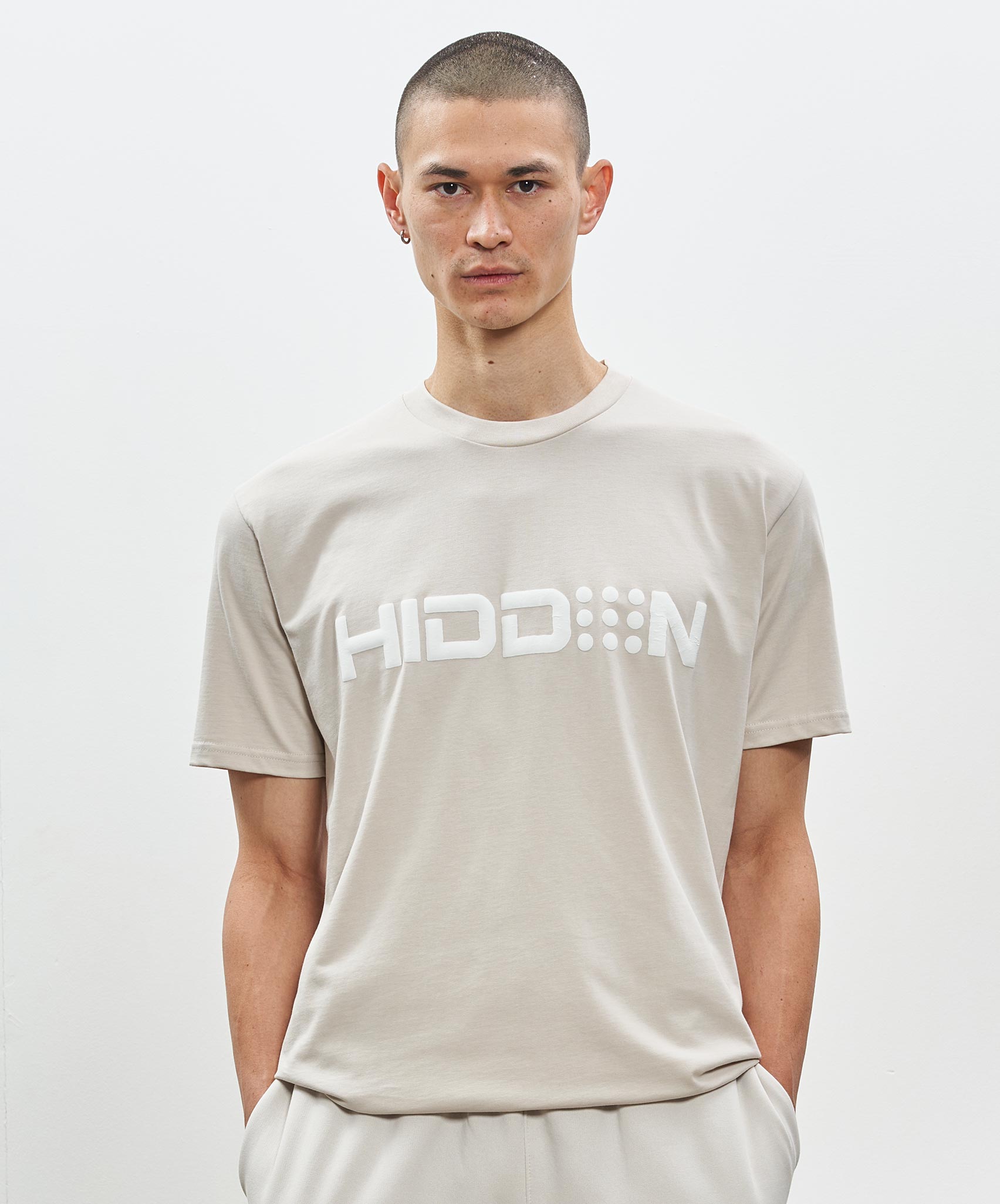 Hidden Hideout Large Logo T-Shirt in Beige
